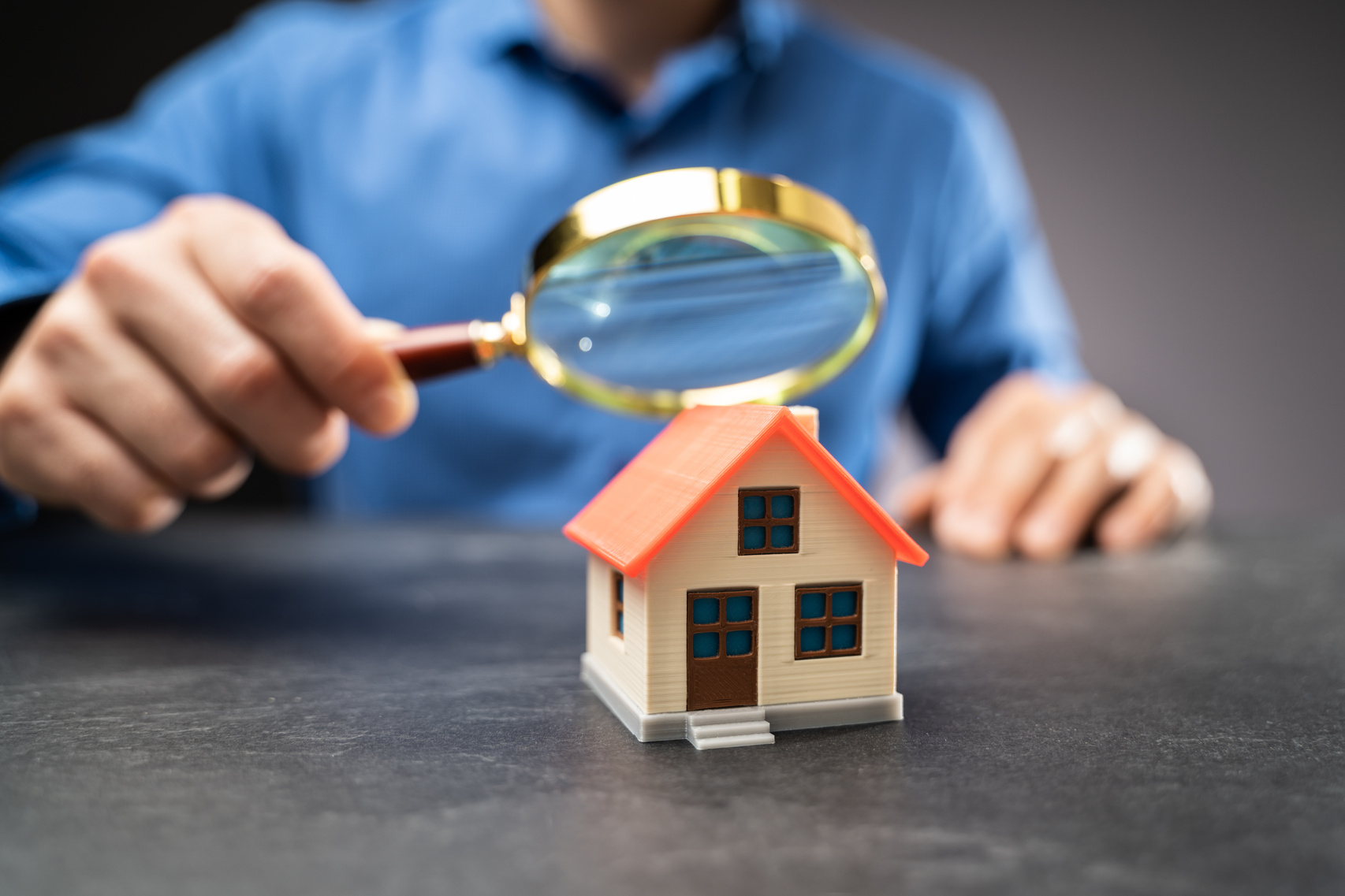 House Or Home Inspection Using Magnifying Glass. Tax